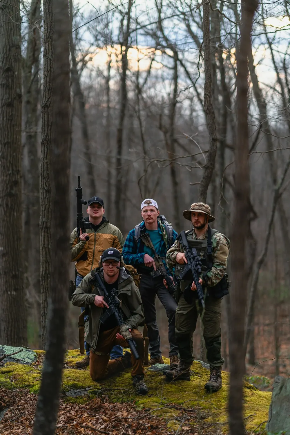 Soldiers in uniform walking together through a forest